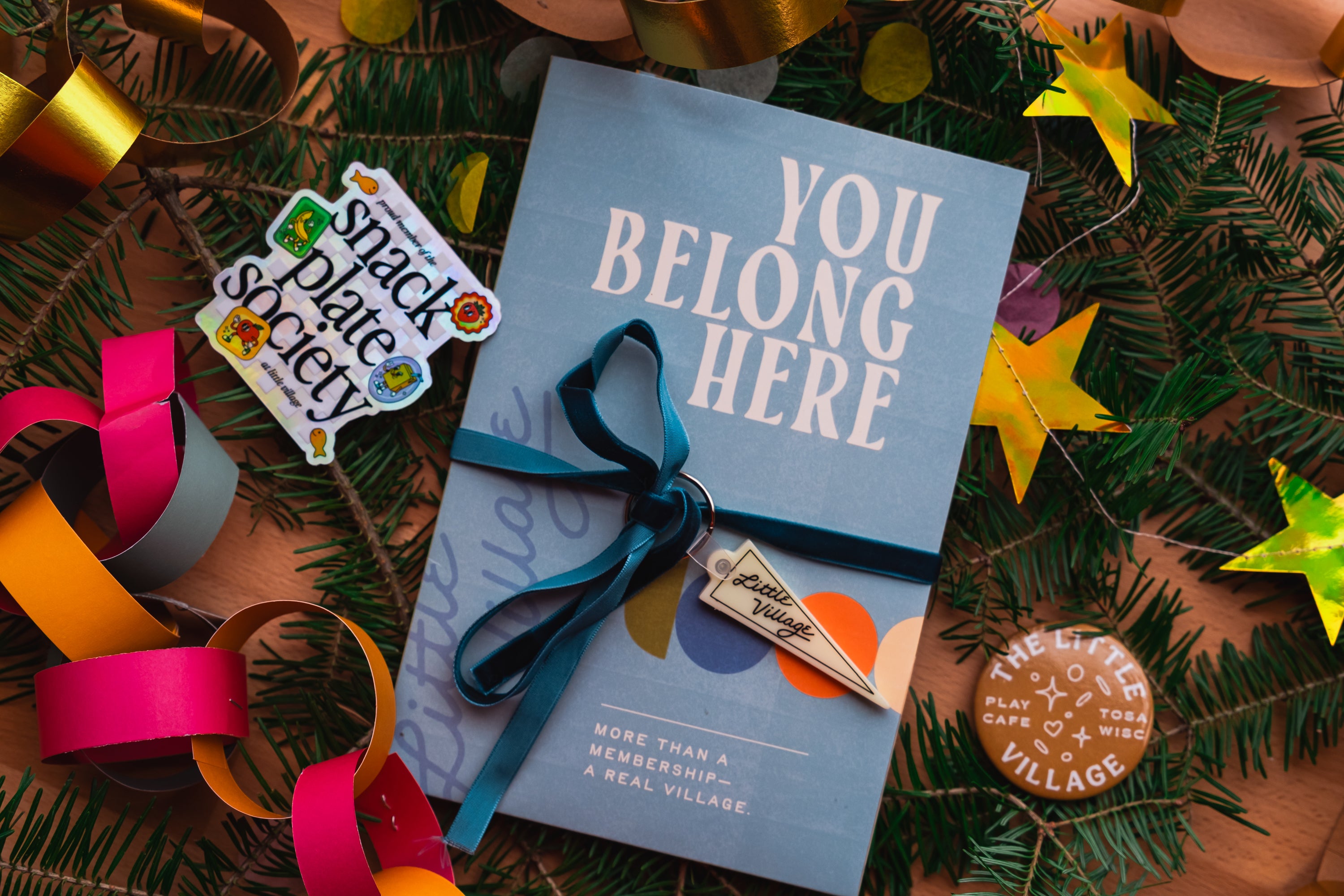 Little Village membership welcome kit tied with a bow